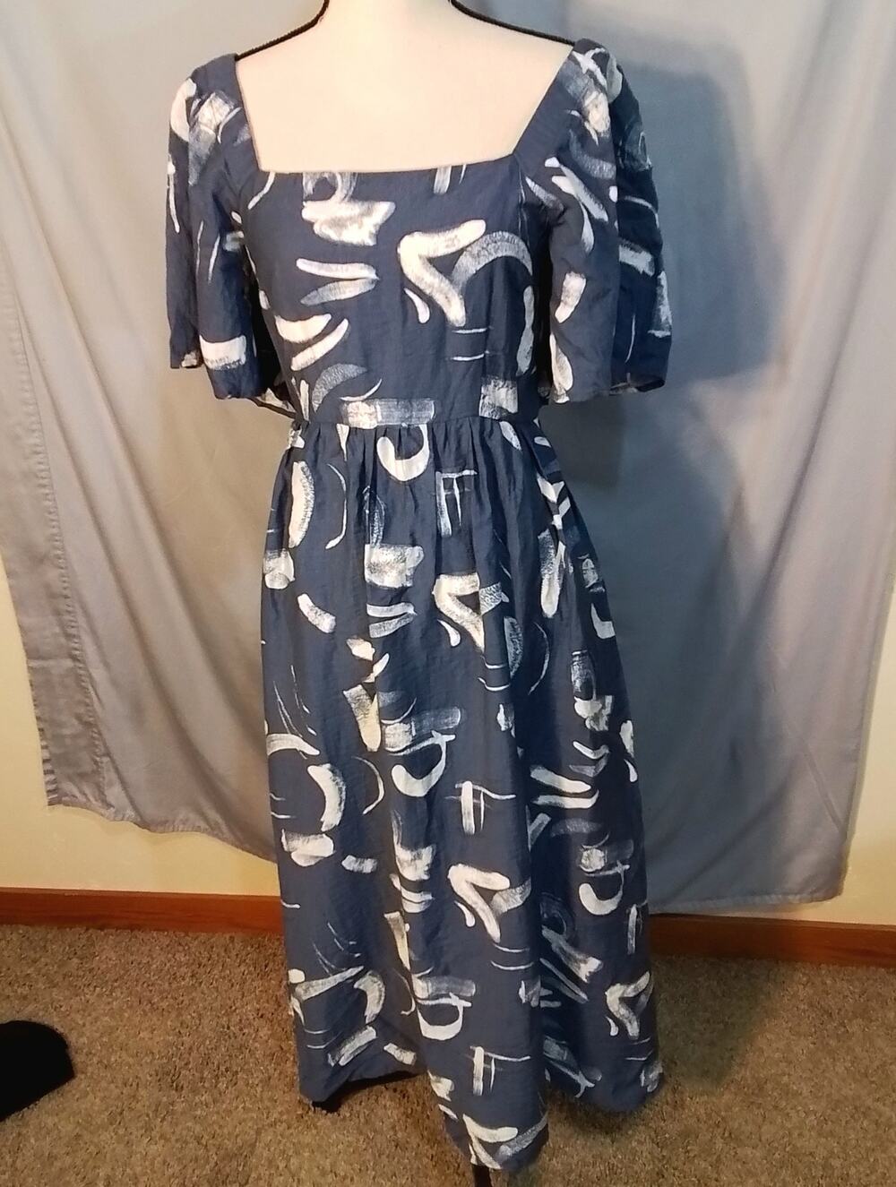 A New Day blue dress with white swishes